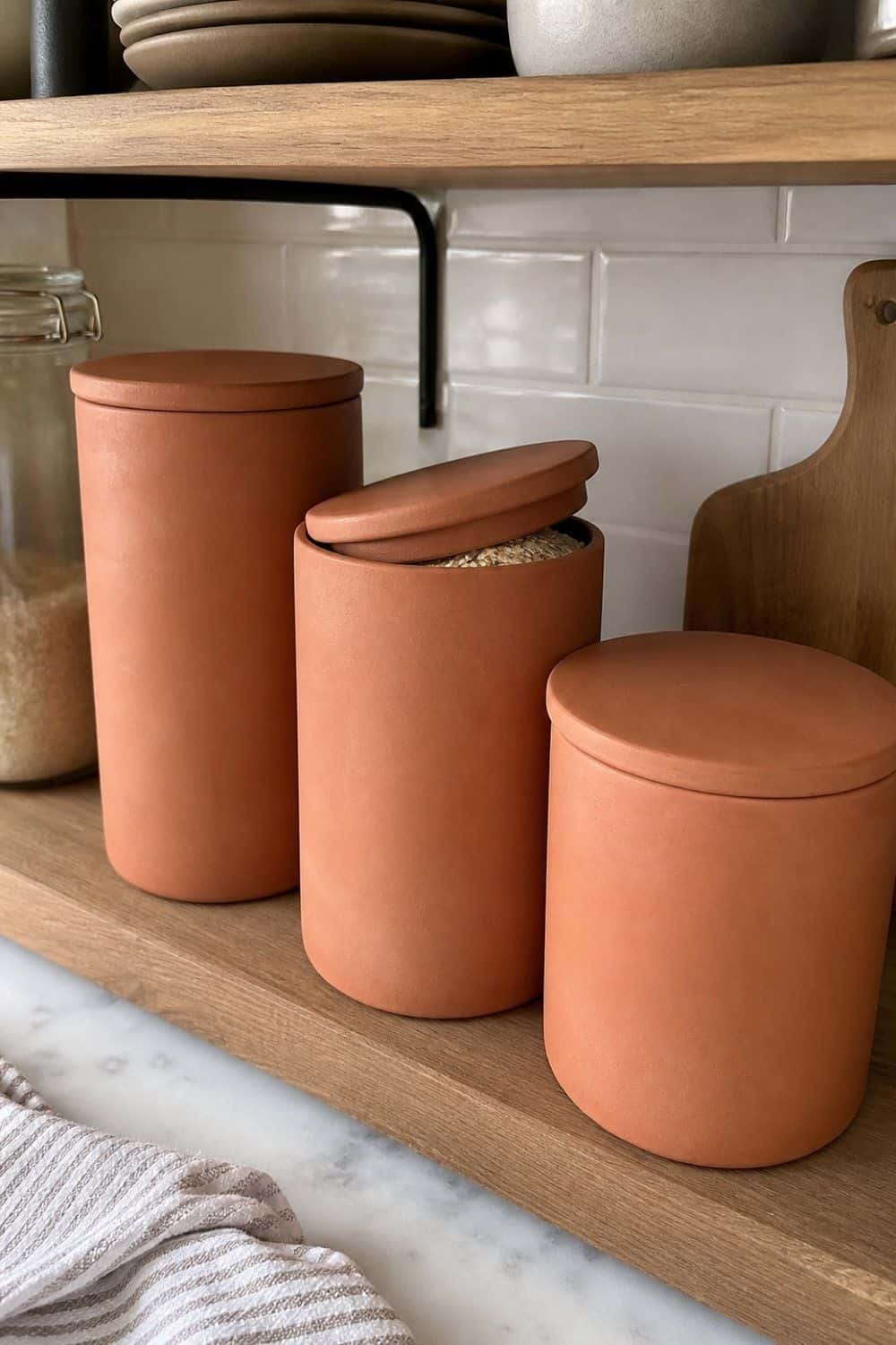 25 Best Earthy Kitchen Decor Finds 8. Terracotta Kitchen Canisters for Dry Goods