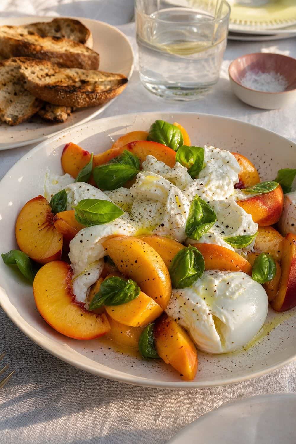 25 European Summer Dinner Party Ideas for a Long, Sunlit Table peaches with burrata or panzanella for a European summer dinner party