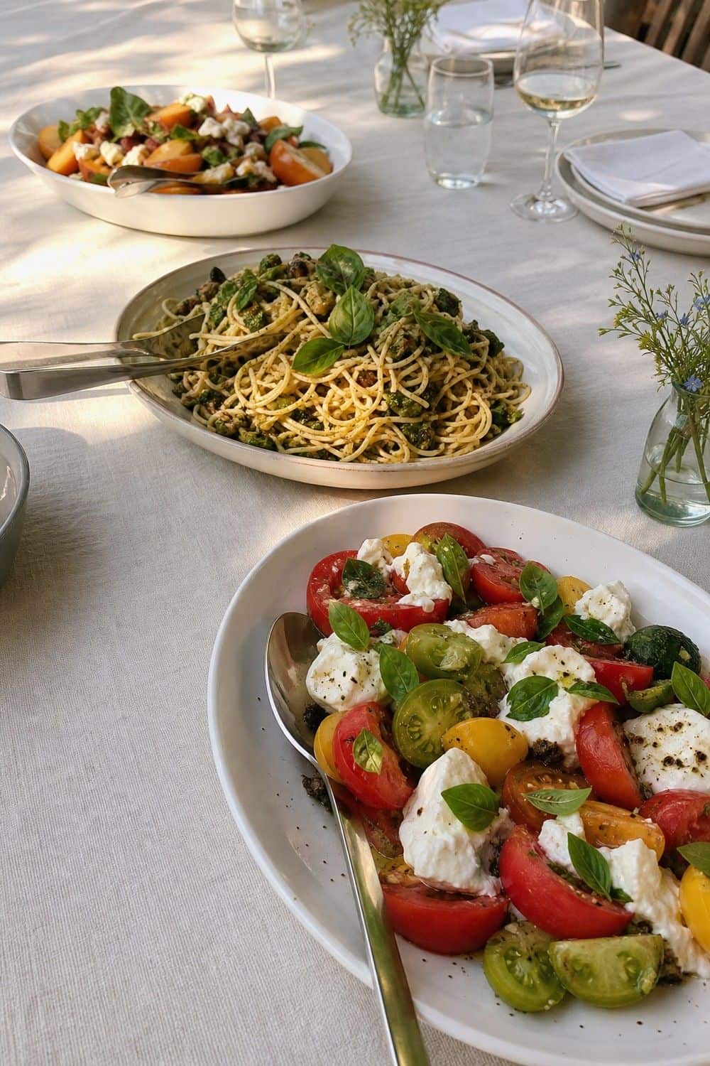 25 European Summer Dinner Party Ideas for a Long, Sunlit Table three strong dishes instead of too many platters for a European summer dinner party