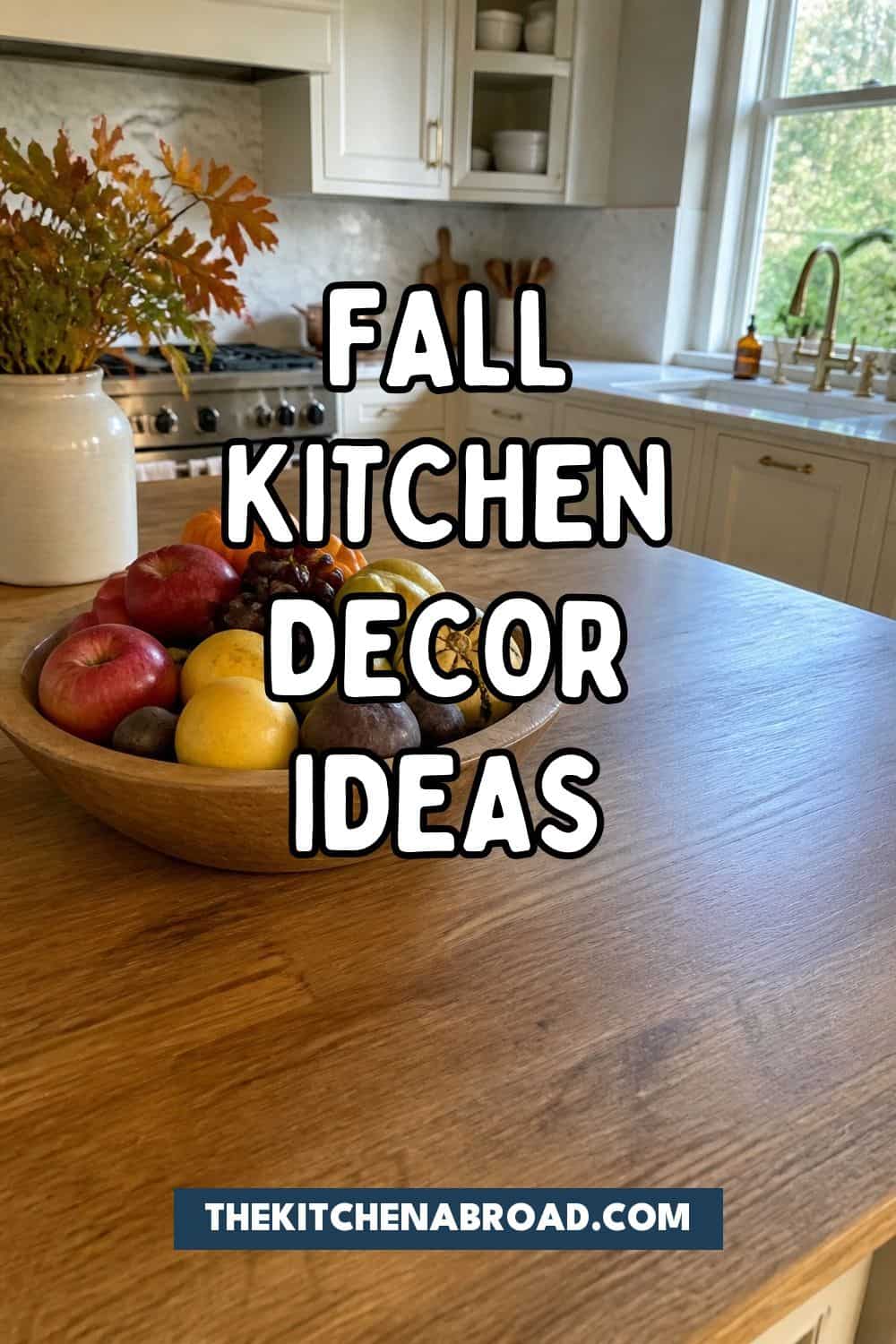 Pinterest pin for fall kitchen decor ideas with a warm harvest kitchen island background.
