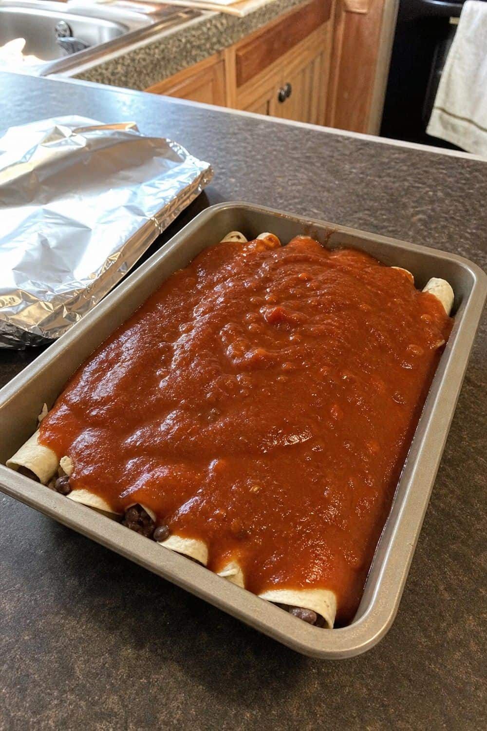 20 Freezer Meal Prep Ideas That Make Life Easier 7. Enchilada Trays Before Baking