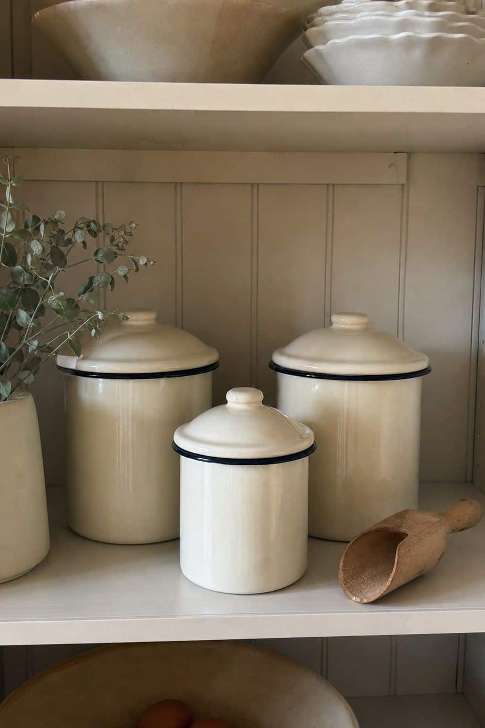 25 Best French Country Kitchen Decor Finds 10. Enamel Canister Set for Pantry Staples