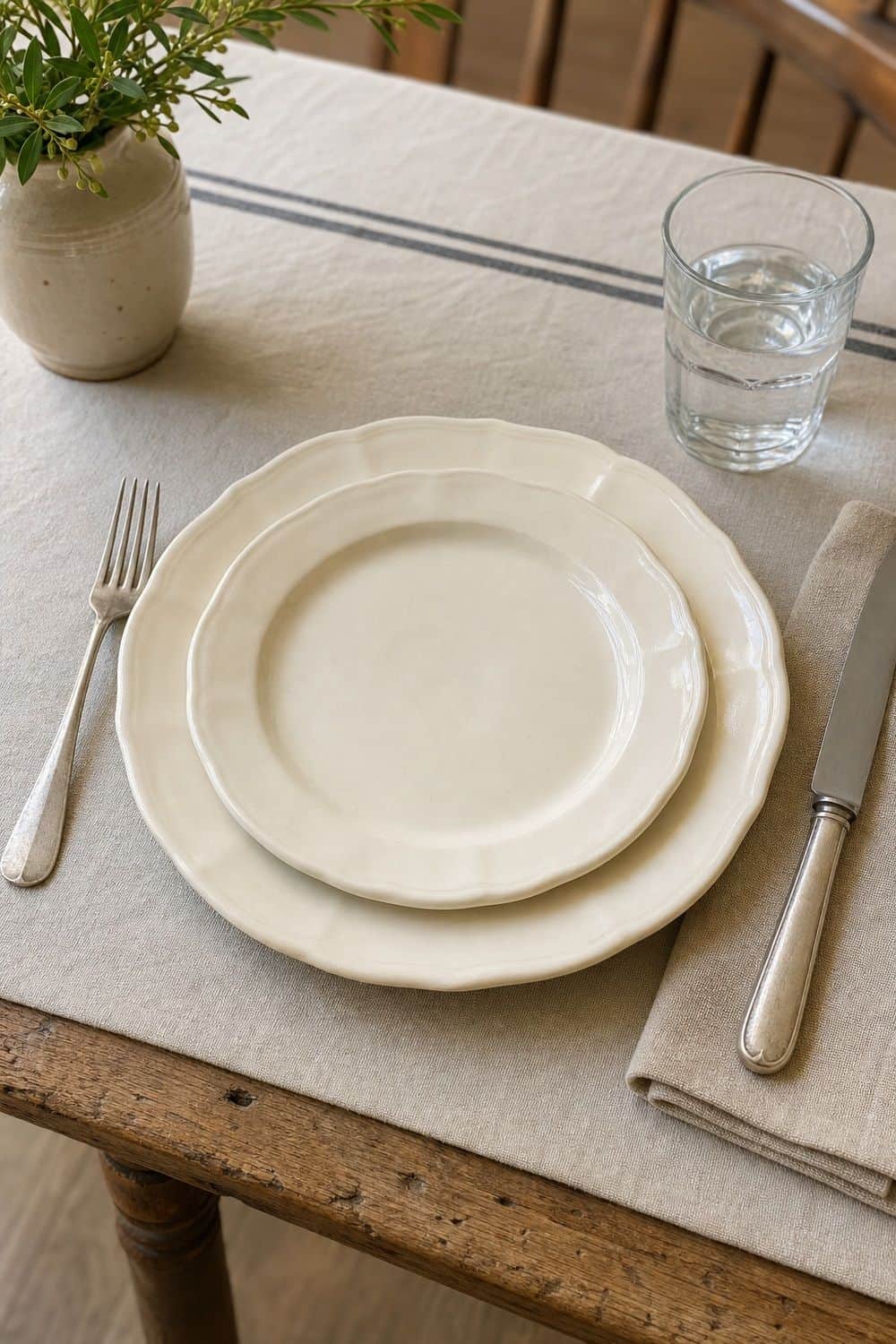 25 French Country Tablescape Ideas for Rustic Elegance 3. Cream Country Plates