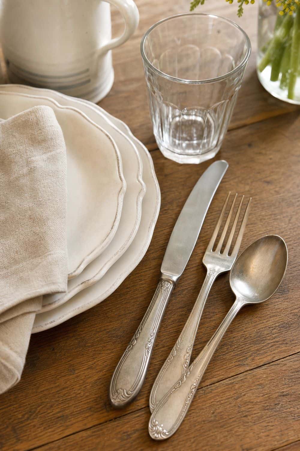 25 French Country Tablescape Ideas for Rustic Elegance 7. Vintage-Style Flatware
