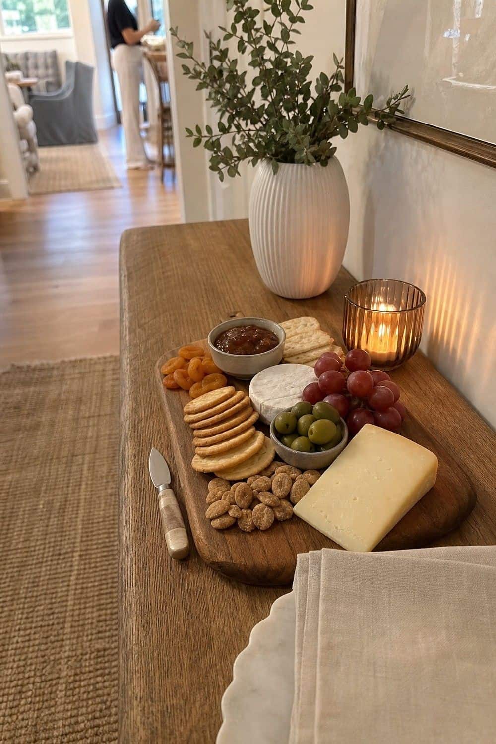 25 Holiday Dinner Party Ideas for Easy Hosting Welcome Board Before Dinner setup for an easy holiday dinner party.