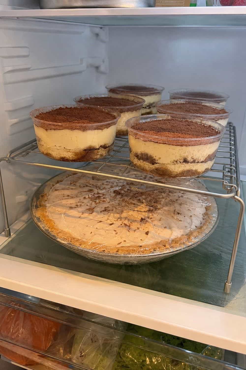 20 Holiday Fridge Ideas for Party Prep and Leftovers Holiday fridge idea showing add a dessert stacking rack.