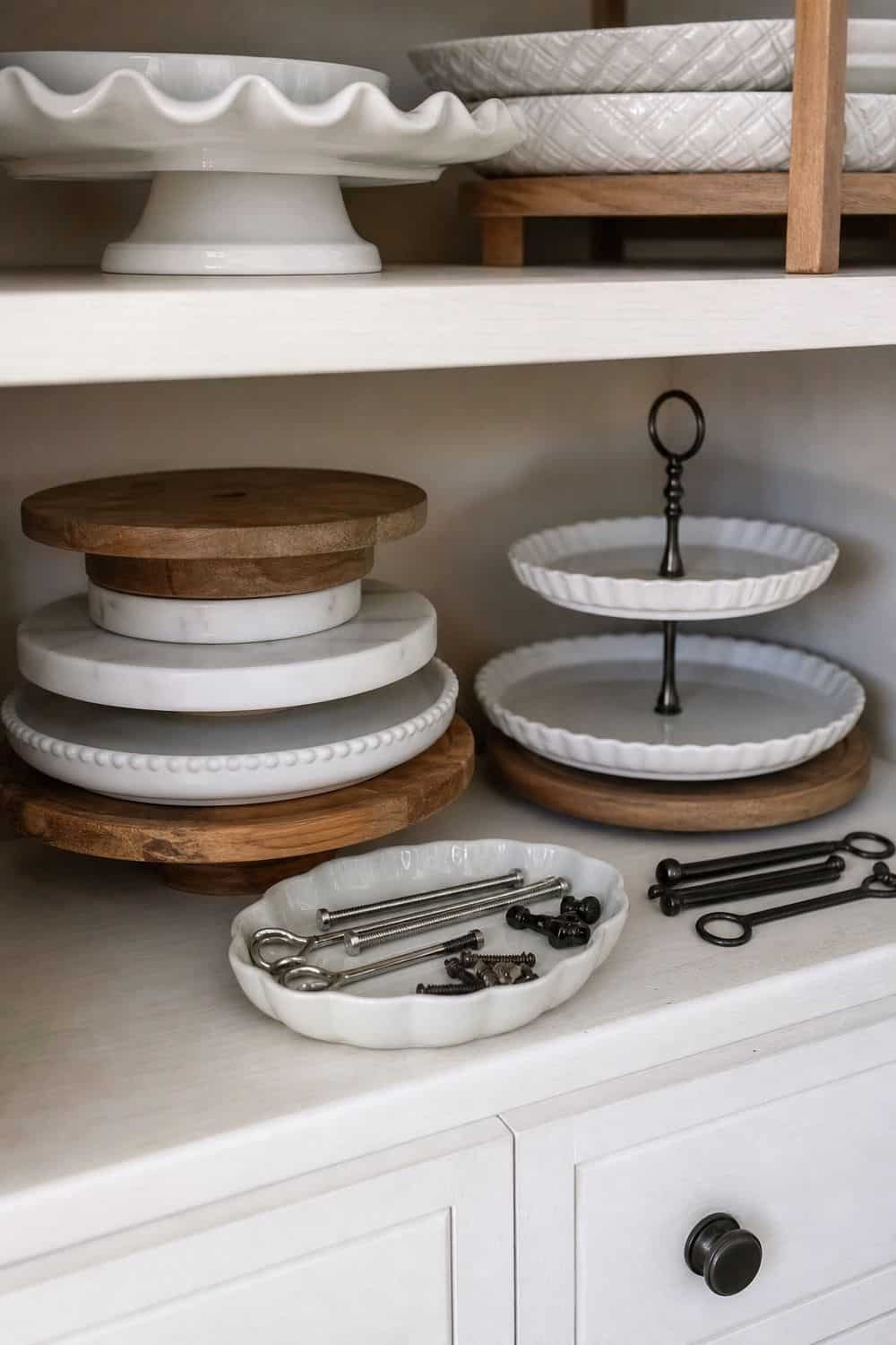 25 Holiday Serving Dish Organization Ideas Use a Tiered Tray Zone for Dessert and Appetizer Stands for holiday serving dish organization in a real home kitchen