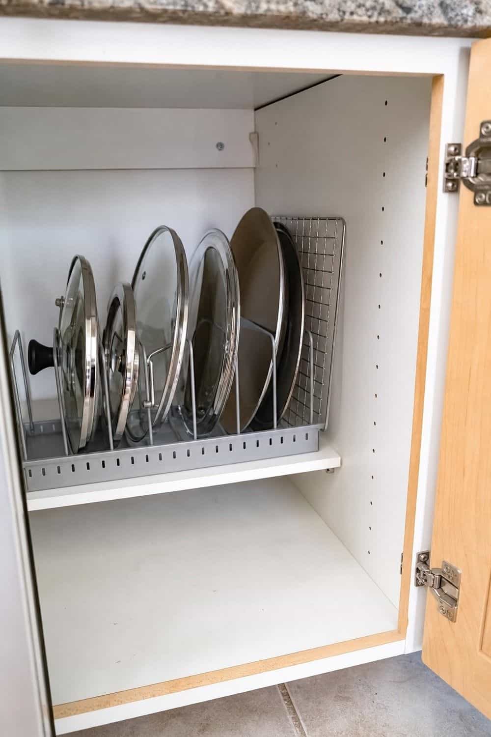 25 IKEA Kitchen Organization Ideas for Smarter Storage 6. Use a VARIERA Pot Lid Organizer