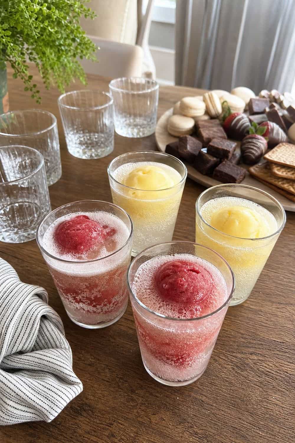 20 New Year's Eve Dessert Board Ideas for Easy Hosting New Year's Eve dessert board idea with include sparkling sorbet float cups