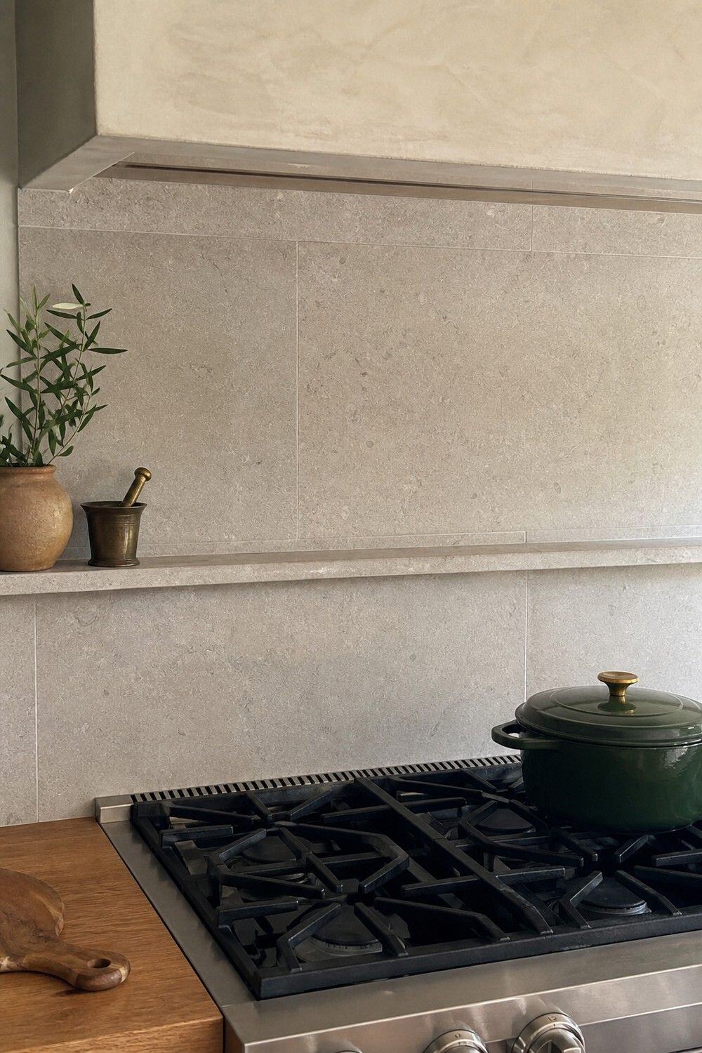 25 Old-World Kitchen Ideas for Rich, Timeless Character 4. Honed Range-Wall Stone