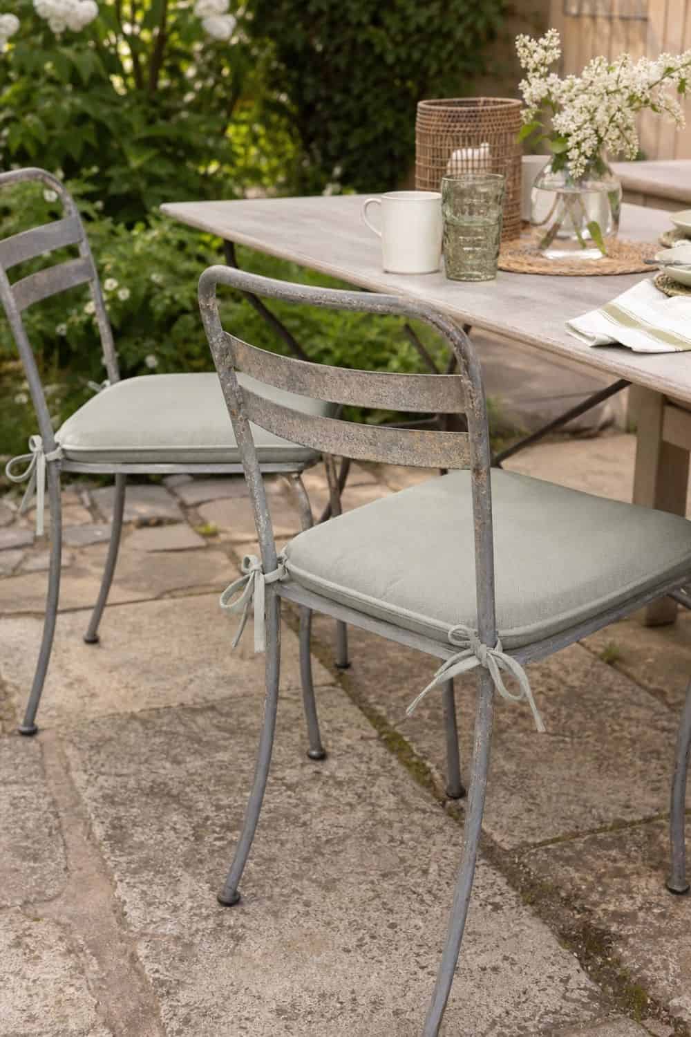 25 Spring Garden Brunch Hosting Ideas for an Outdoor Table Cushions for Hard Garden Chairs for a spring garden brunch outdoor table