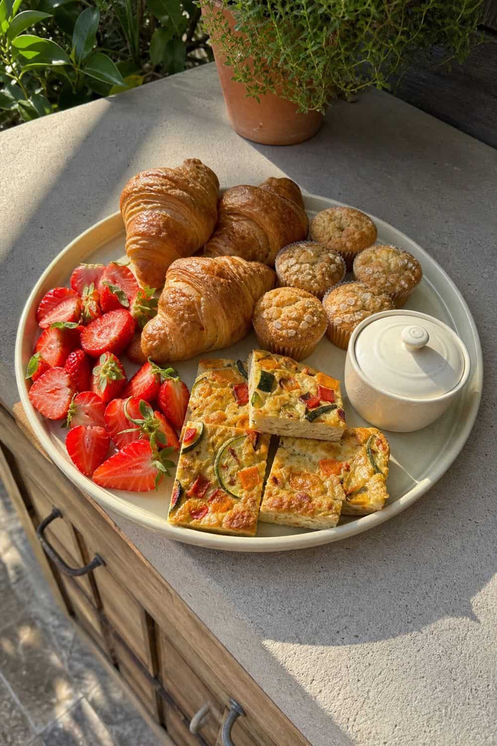 25 Spring Garden Brunch Hosting Ideas for an Outdoor Table Room-Temperature Platter for Easy Serving for a spring garden brunch outdoor table