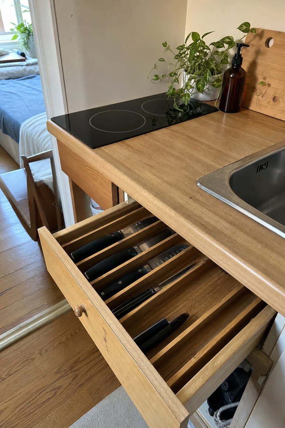 25 Studio Apartment Kitchen Ideas for Calm One-Room Living In-drawer knife organizer holding kitchen knives