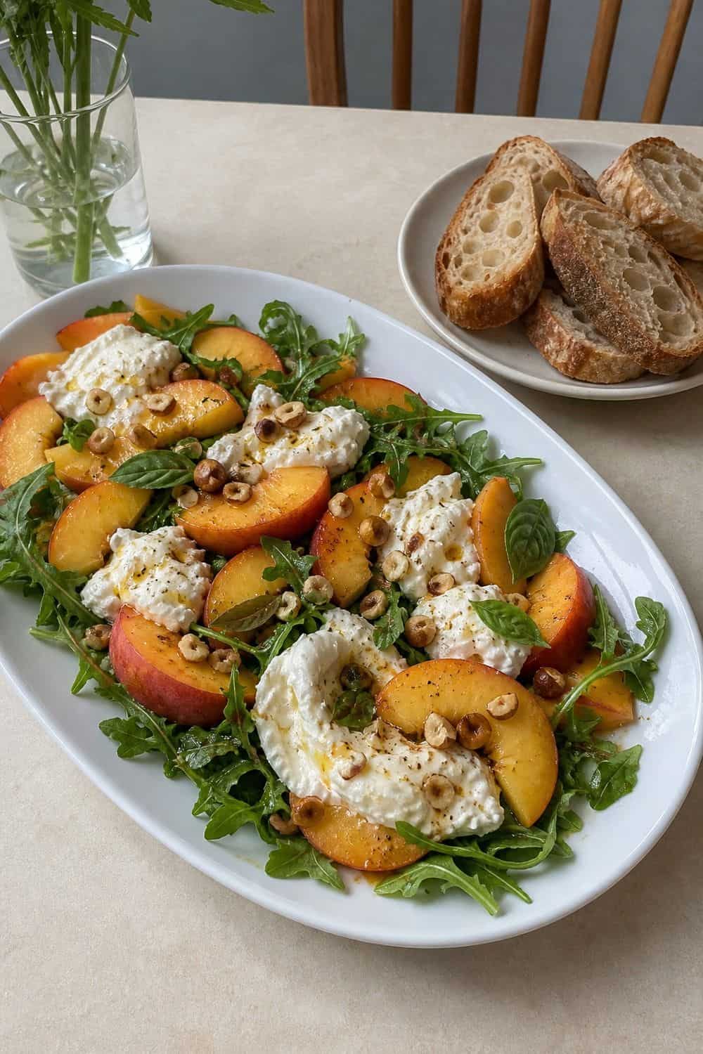 15 Summer Fruit Ideas for Cozy Food Moments Peach Burrata and Arugula Plate summer fruit idea