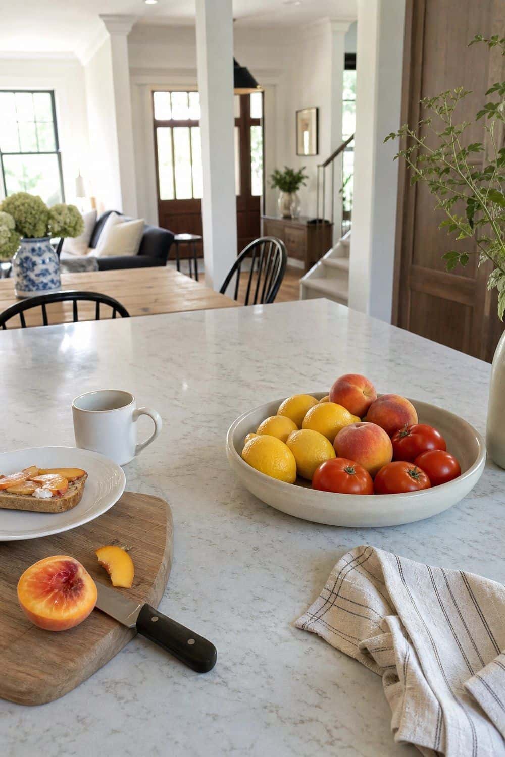 25 Summer Kitchen Decor Ideas for a Lighter Seasonal Look Low Bowl on the Kitchen Island in a bright, realistic summer kitchen setting
