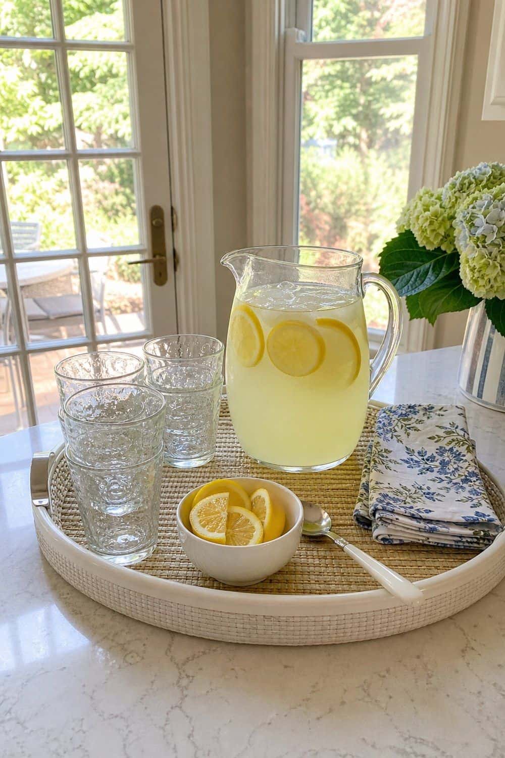 25 Summer Kitchen Decor Ideas for a Lighter Seasonal Look Lemonade Drink Station in a bright, realistic summer kitchen setting