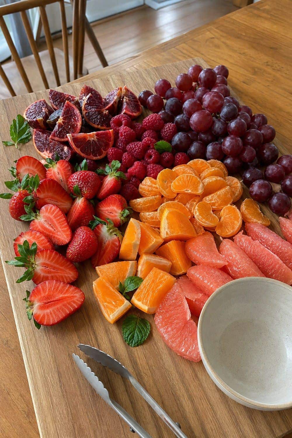 25 Valentine's Day Brunch Hosting Ideas for a Pretty Morning Table 7. Make a Berry and Citrus Fruit Board for Valentine’s Day brunch