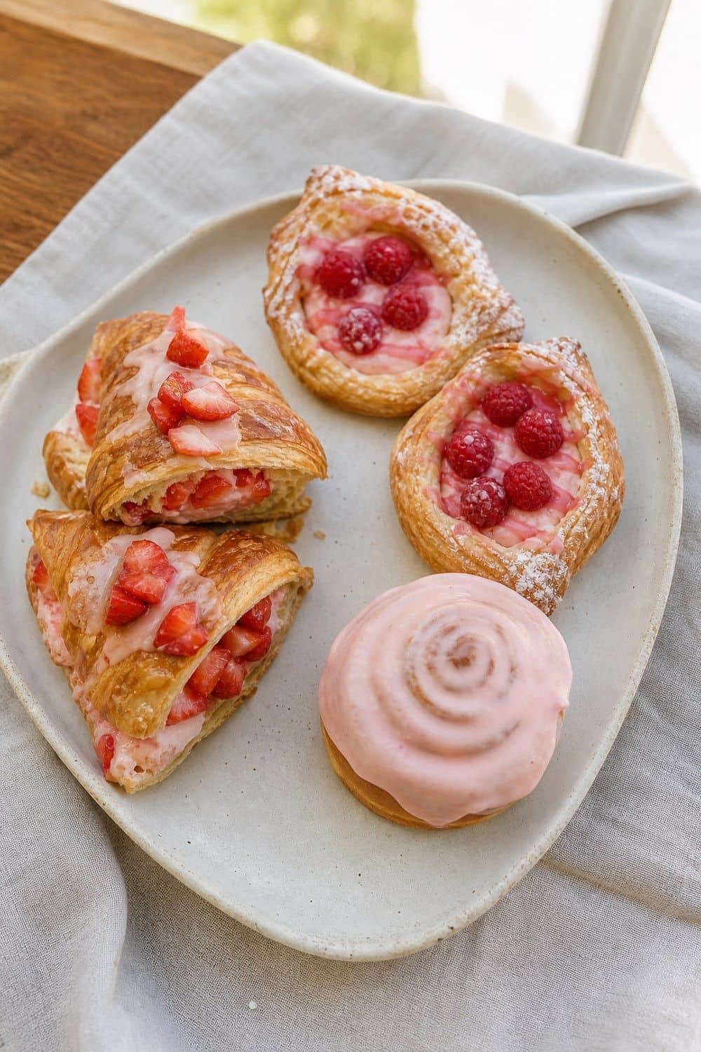 25 Valentine's Day Brunch Hosting Ideas for a Pretty Morning Table 8. Add Pink Pastries From a Bakery for Valentine’s Day brunch