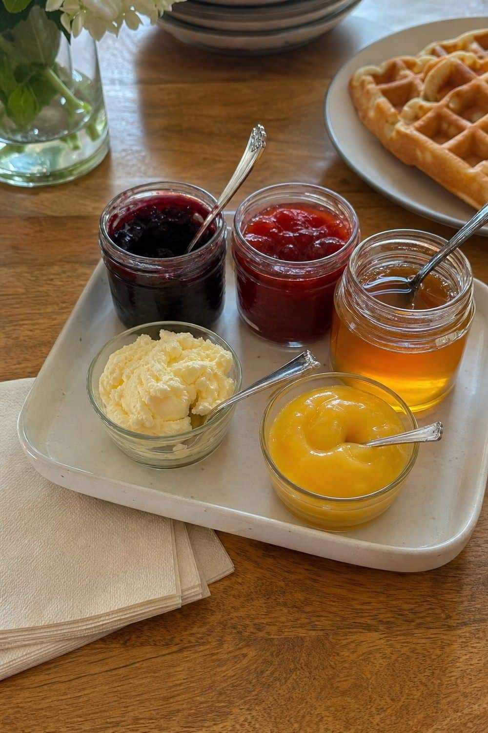 25 Valentine's Day Brunch Hosting Ideas for a Pretty Morning Table 21. Make a Jam and Honey Topping Tray for Valentine’s Day brunch