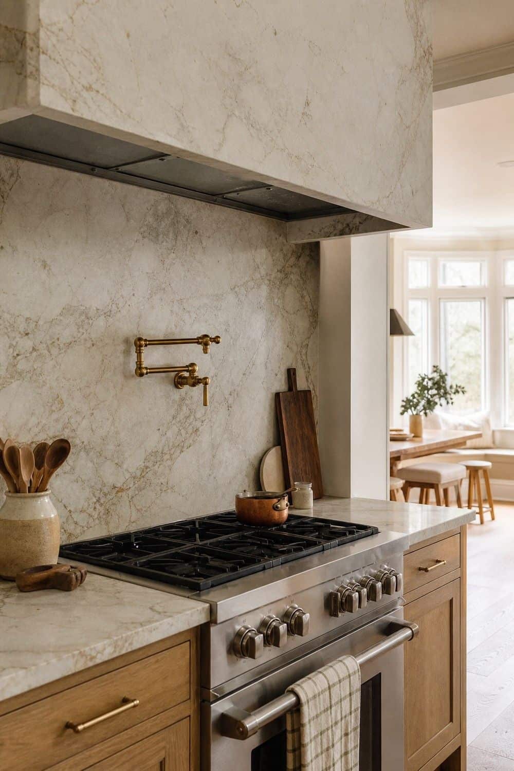 25 Warm Neutral Kitchen Ideas for a Softer Modern Look 8. Extend Stone Into a Full-Height Backsplash